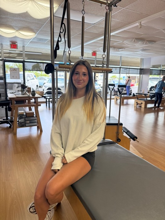 Raegan S., front desk at Love Pilates